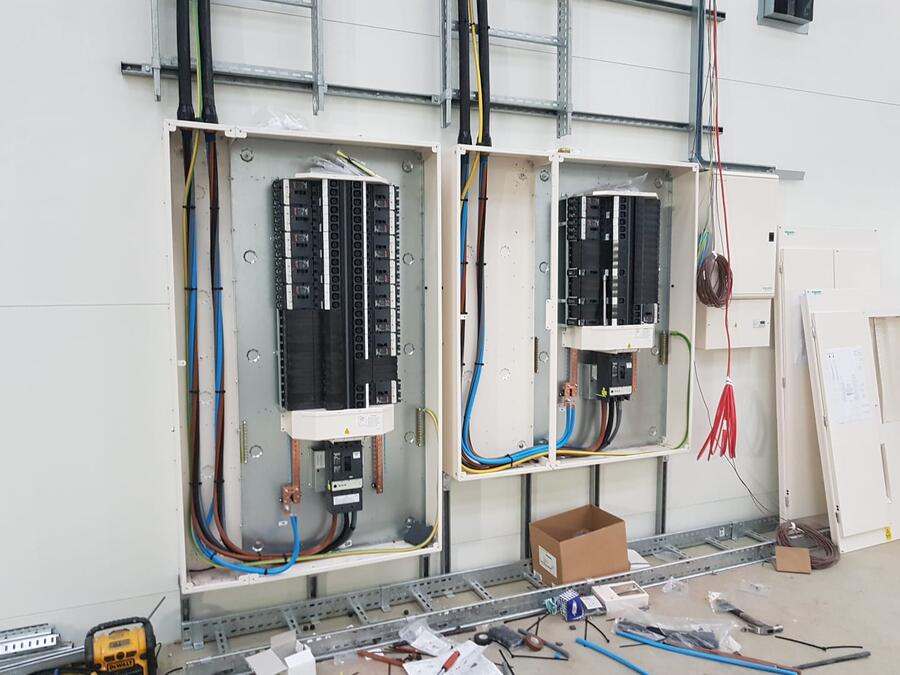 Three-phase commercial distribution board installation at a workshop in South Wales